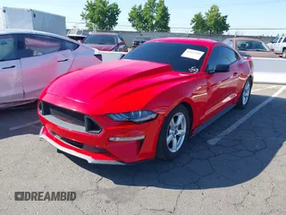 2019 Ford Mustang EcoBoost with VIN 1FA6P8TH7K5135493, listed as a IAAI auction lot 42842509 with 90,931 mi miles and . Bid and sale history available at DreamBid. Image 2.