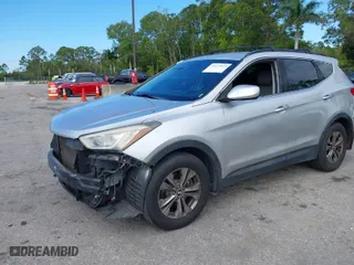 2014 Hyundai Santa Fe Sport with VIN 5XYZU3LB0EG198641, listed as a IAAI auction lot 41673814 with 113,027 mi miles. Bid and sale history available at carsss.com. Image 2.