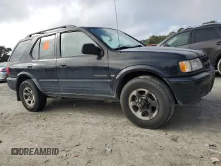 2001 Isuzu Rodeo S with VIN 4S2CK58W214338866, listed as a Copart auction lot 85280494 with 57,279 mi miles and Clean title. Bid and sale history available at DreamBid. Image 4.