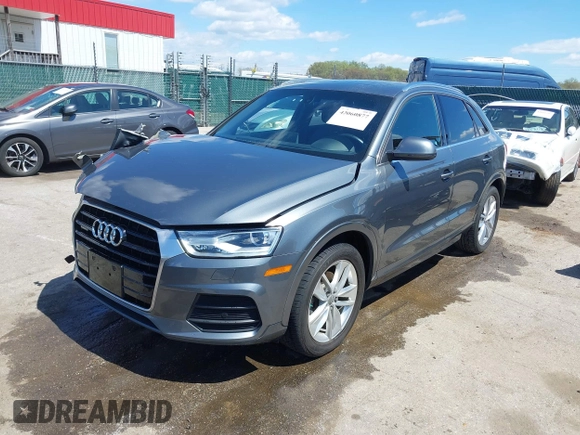 2017 Audi Q3 Premium Plus z VIN WA1JCCFS5HR003127, wystawiony jako IAAI lot #42060877 z przebiegiem 78 881 mil mil oraz . Historia ofert i sprzedaży dostępna na DreamBid. Obrazek 17.