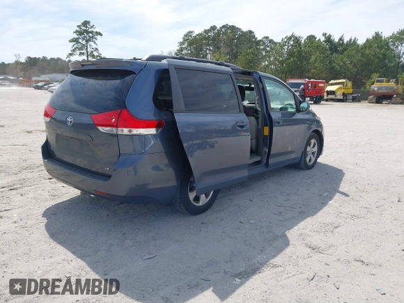 2014 Toyota Sienna LE AAS with VIN 5TDKK3DCXES498110, listed as a IAAI auction lot 41847116 with 242,065 mi miles and . Bid and sale history available at DreamBid. Image 4.