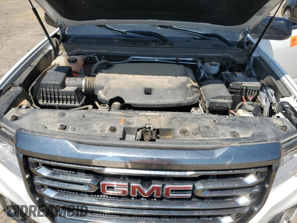 2021 GMC Canyon 4WD AT4 z VIN 1GTG6FEN5M1118081, wystawiony jako Copart lot #52452785 z przebiegiem 92 960 mil mil oraz Szkody całkowita. Historia ofert i sprzedaży dostępna na DreamBid. Obrazek 11.