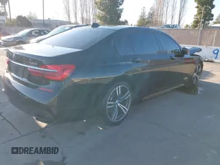 2018 BMW 7 Series 750i with VIN WBA7F0C50JGM24160, listed as a IAAI auction lot 41448519 with 138,742 mi miles. Bid and sale history available at carsss.com. Image 4.