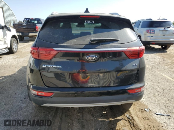 2018 Kia Sportage EX z VIN KNDPN3AC8J7450904, wystawiony jako Copart lot #76091074 z przebiegiem 104 850 mil mil oraz Szkoda całkowita • Salvage title. Historia ofert i sprzedaży dostępna na DreamBid. Obrazek 6.