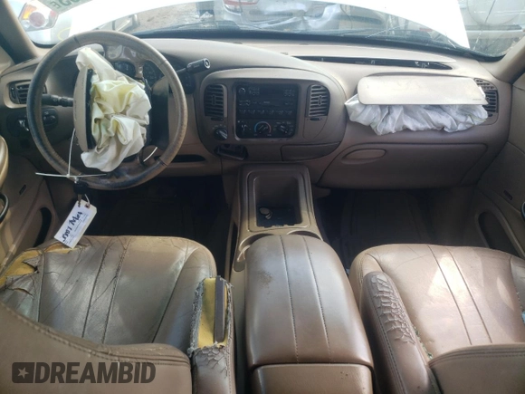 1998 Ford Expedition XLT z VIN 1FMPU18L7WLA74705, wystawiony jako Copart lot #82522704 z przebiegiem 275 355 mil mil oraz Szkoda całkowita • Salvage title. Historia ofert i sprzedaży dostępna na DreamBid. Obrazek 8.