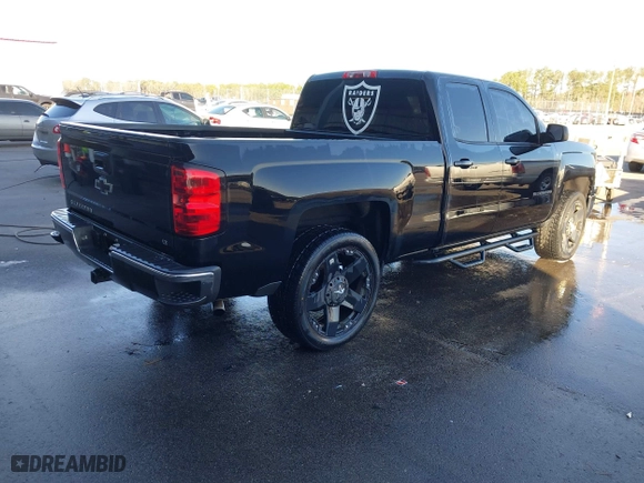 2014 Chevrolet Silverado 1500 LT with VIN 1GCRCREC5EZ400824, listed as a IAAI auction lot 41658622 with 107,105 mi miles. Bid and sale history available at carsss.com. Image 4.