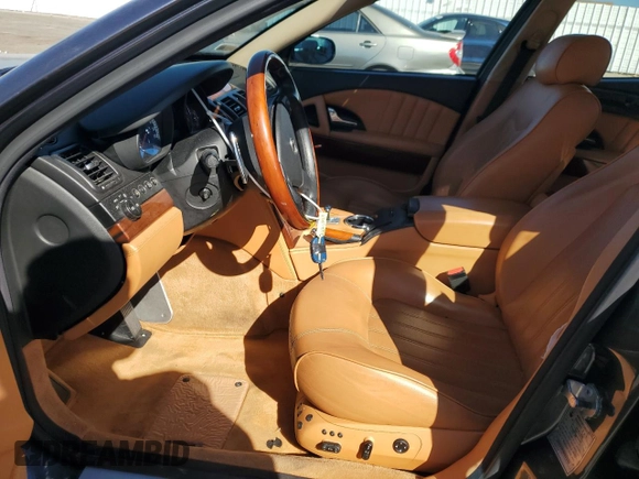 2006 Maserati Quattroporte z VIN ZAMCE39A960023356, wystawiony jako Copart lot #76954384 z przebiegiem 76 185 mil mil oraz Szkody całkowita. Historia ofert i sprzedaży dostępna na DreamBid. Obrazek 7.