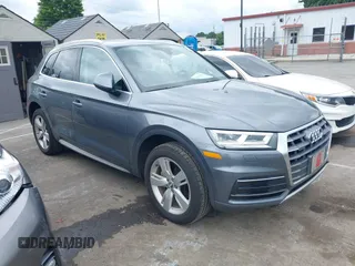 2018 Audi Q5 Premium Plus z VIN WA1BNAFY9J2051736, wystawiony jako IAAI lot #42376181 z przebiegiem 114 754 mil mil oraz . Historia ofert i sprzedaży dostępna na DreamBid. Obrazek 1.