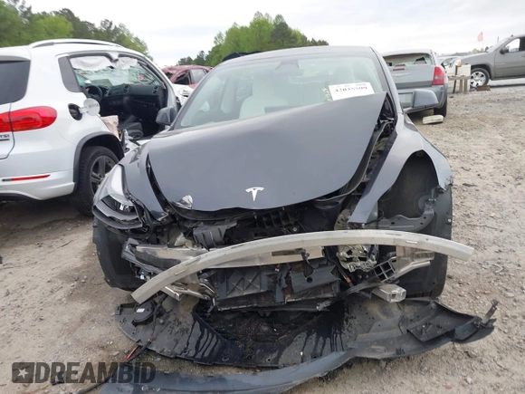 2022 Tesla Model 3 Long Range z VIN 5YJ3E1EB8NF315359, wystawiony jako IAAI lot #42035599 z przebiegiem 54 974 mil mil oraz . Historia ofert i sprzedaży dostępna na DreamBid. Obrazek 12.