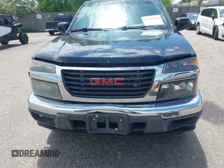 2011 GMC Canyon SLE1 z VIN 1GTH6MFE8B8112755, wystawiony jako IAAI lot #42359366 z przebiegiem 153 905 mil mil oraz . Historia ofert i sprzedaży dostępna na DreamBid. Obrazek 6.