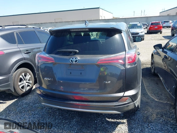 2018 Toyota RAV4 XLE with VIN JTMWFREV6JJ175575, listed as a IAAI auction lot 41788004 with 112,577 mi miles. Bid and sale history available at carsss.com. Image 16.