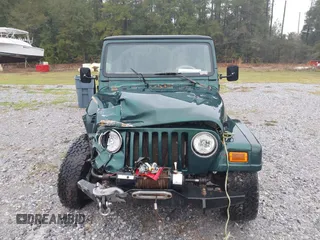 2000 Jeep Wrangler Sahara with VIN 1J4FA59SXYP701098, listed as a IAAI auction lot 41592872 with 1 mi miles. Bid and sale history available at carsss.com. Image 11.