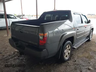 2007 Honda Ridgeline RTL z VIN 2HJYK16537H521608, wystawiony jako IAAI lot #42112626 z przebiegiem 197 076 mil mil oraz . Historia ofert i sprzedaży dostępna na DreamBid. Obrazek 4.