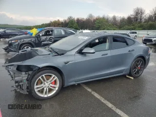 2014 Tesla Model S 60 with VIN 5YJSA1H14EFP28471, listed as a Copart auction lot 64928534 with 99,442 mi miles and Clean Title. Bid and sale history available at DreamBid. Image 1.
