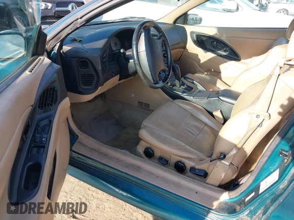 1999 Mitsubishi Eclipse GS-T with VIN 4A3AX55F6XE052978, listed as a IAAI auction lot 41841812 with 92,776 mi miles and . Bid and sale history available at carsss.com. Image 5.