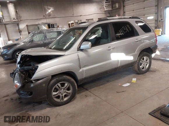 2005 Kia Sportage LX with VIN KNDJE723X57071792, listed as a IAAI auction lot 41441318 with 249,652 mi miles and . Bid and sale history available at carsss.com. Image 18.