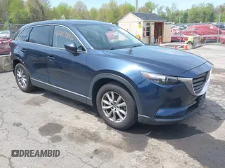 2019 Mazda CX-9 Touring z VIN JM3TCBCY6K0331905, wystawiony jako IAAI lot #42157842 z przebiegiem 84 211 mil mil oraz . Historia ofert i sprzedaży dostępna na DreamBid. Obrazek 1.
