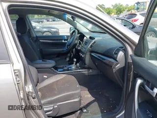 2014 Kia Sorento LX with VIN 5XYKT3A60EG486699, listed as a IAAI auction lot 42143270 with 127,190 mi miles and . Bid and sale history available at DreamBid. Image 5.