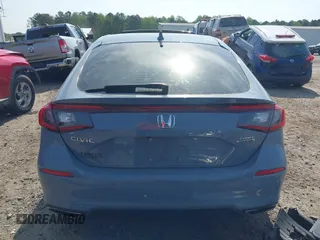 2022 Honda Civic Sport Touring z VIN 19XFL1H82NE003000, wystawiony jako IAAI lot #42020685 z przebiegiem 46 740 mil mil oraz . Historia ofert i sprzedaży dostępna na DreamBid. Obrazek 17.