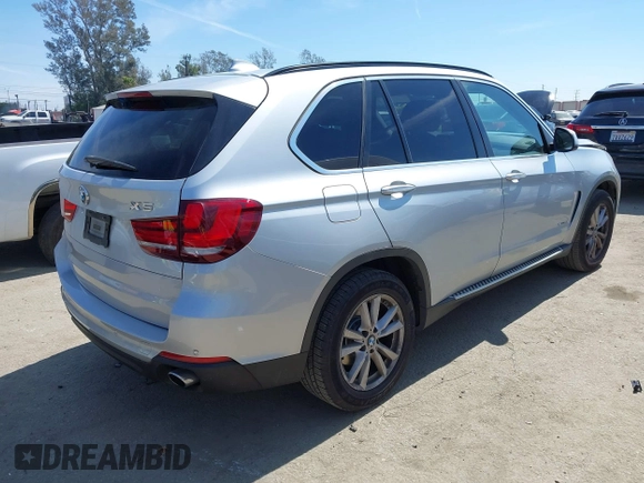 2014 BMW X5 sDrive35i with VIN 5UXKR2C54E0H31217, listed as a IAAI auction lot 41881021 with 163,492 mi miles. Bid and sale history available at carsss.com. Image 4.