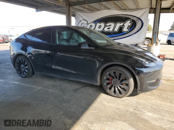 2022 Tesla Model Y Performance with VIN 7SAYGDEF5NF339965, listed as a Copart auction lot 62187545 with 93,156 mi miles and Salvage title. Bid and sale history available at DreamBid. Image 4.