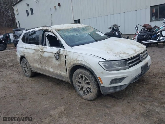 2021 Volkswagen Tiguan SE with VIN 3VV2B7AX4MM009456, listed as a IAAI auction lot 41876861 with 72,203 mi miles. Bid and sale history available at carsss.com. Image 1.