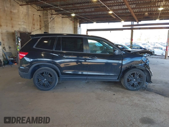 2021 Honda Passport Sport with VIN 5FNYF8H27MB021098, listed as a IAAI auction lot 41333241 with 101,239 mi miles and . Bid and sale history available at DreamBid. Image 13.