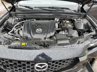 2023 Mazda CX-50 S Preferred Plus z VIN 7MMVABCMXPN118034, wystawiony jako Copart lot #52315725 z przebiegiem 36 890 mil mil oraz Szkoda całkowita • Salvage title. Historia ofert i sprzedaży dostępna na DreamBid. Obrazek 12.