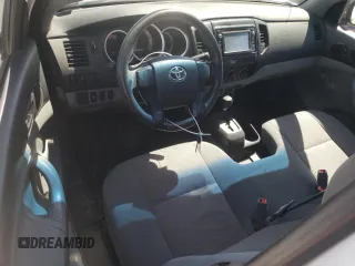 2014 Toyota Tacoma z VIN 5TFNX4CNXEX034493, wystawiony jako Copart lot #52005944 z przebiegiem 83 979 mil mil oraz Szkoda całkowita • Salvage title. Historia ofert i sprzedaży dostępna na DreamBid. Obrazek 8.