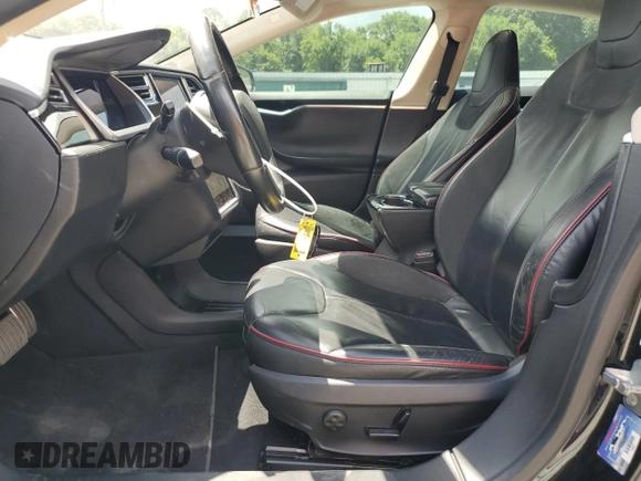 2013 Tesla Model S Performance с VIN 5YJSA1CP8DFP20786, выставлен на аукционе Copart как лот 61035395 с пробегом 140 119 миль миль и Списание • Salvage title. История ставок и продаж доступна на DreamBid. Изображение 7.