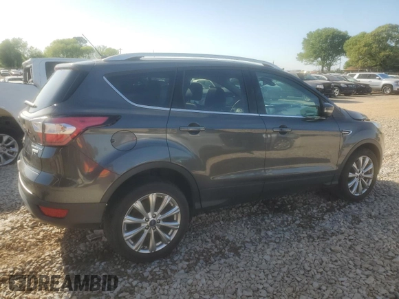 2017 Ford Escape Titanium with VIN 1FMCU0J92HUA37355, listed as a Copart auction lot 52365875 with 82,651 mi miles and Salvage Title. Bid and sale history available at carsss.com. Image 3.