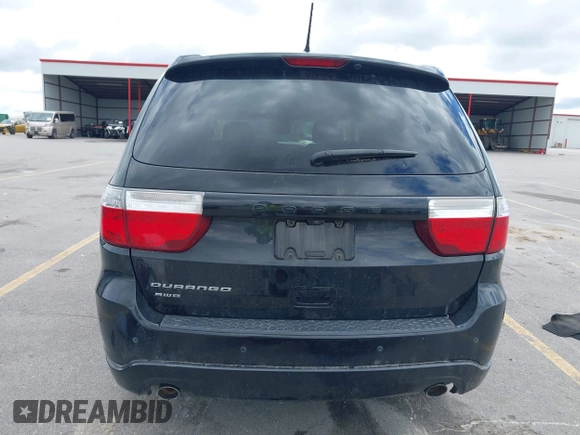 2013 Dodge Durango SXT with VIN 1C4RDJAG4DC697450, listed as a IAAI auction lot 42336657 with 177,476 mi miles and . Bid and sale history available at DreamBid. Image 16.