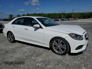 2014 Mercedes-Benz E 350 Sport with VIN WDDHF5KB8EA828799, listed as a Copart auction lot 52600805 with 113,755 mi miles and Salvage Title. Bid and sale history available at DreamBid. Image 4.