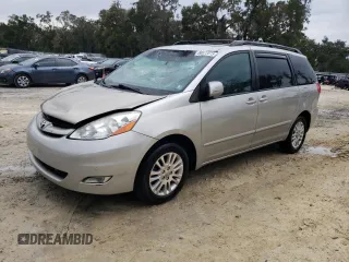 2009 Toyota Sienna XLE with VIN 5TDBK22C89S027706, listed as a Copart auction lot 88672015 with 215,515 mi miles and Salvage Title. Bid and sale history available at carsss.com. Image 1.