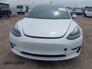 2022 Tesla Model 3 Long Range z VIN 5YJ3E1EB7NF241075, wystawiony jako IAAI lot #42217269 z przebiegiem 28 856 mil mil oraz . Historia ofert i sprzedaży dostępna na DreamBid. Obrazek 6.