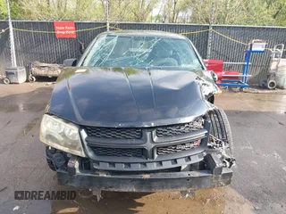 2014 Dodge Avenger SE with VIN 1C3CDZAB6EN120955, listed as a IAAI auction lot 42030602 with Not provided miles and . Bid and sale history available at DreamBid. Image 12.