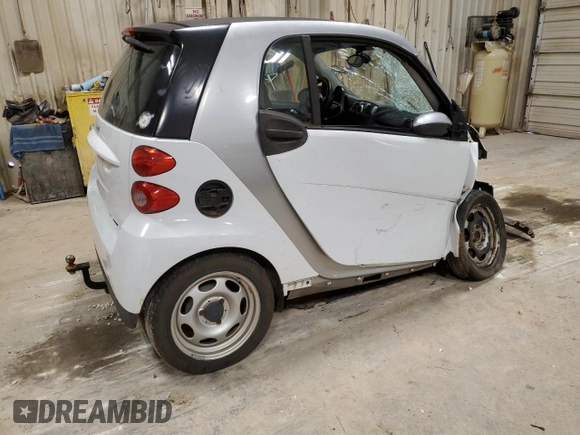 2010 Smart fortwo Pure z VIN WMEEJ3BA7AK418332, wystawiony jako Copart lot #54827925 z przebiegiem 39 972 mil mil oraz Szkoda całkowita • Salvage title. Historia ofert i sprzedaży dostępna na DreamBid. Obrazek 3.
