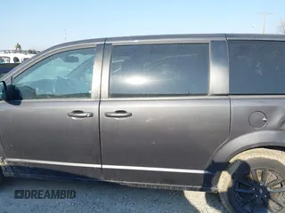 2019 Dodge Grand Caravan SE with VIN 2C4RDGBGXKR727315, listed as a IAAI auction lot 41770222 with 97,561 mi miles and . Bid and sale history available at DreamBid. Image 14.