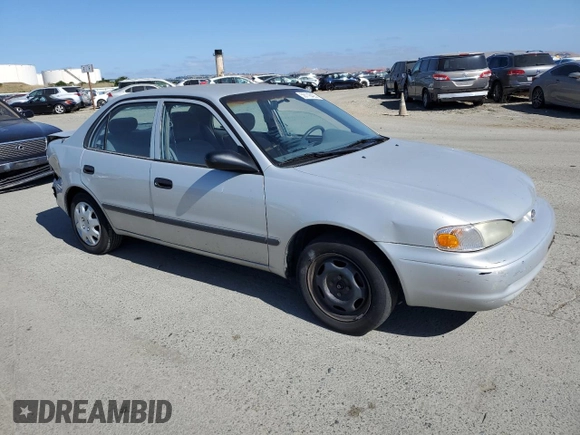 2002 Chevrolet Prizm z VIN 1Y1SK52862Z410699, wystawiony jako Copart lot #58118425 z przebiegiem 157 609 mil mil oraz Szkoda całkowita • Salvage title. Historia ofert i sprzedaży dostępna na DreamBid. Obrazek 4.