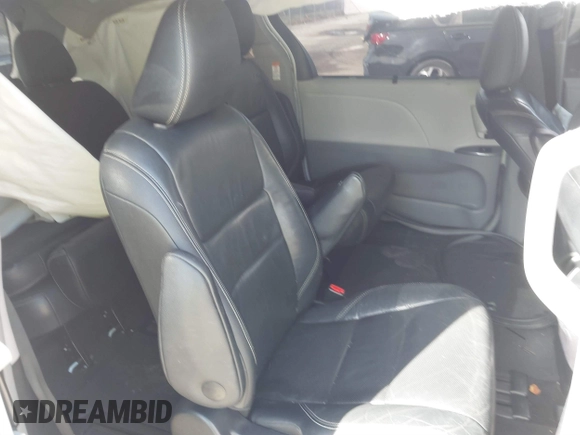 2015 Toyota Sienna SE with VIN 5TDXK3DC4FS678965, listed as a IAAI auction lot 40817635 with 147,027 mi miles. Bid and sale history available at carsss.com. Image 8.