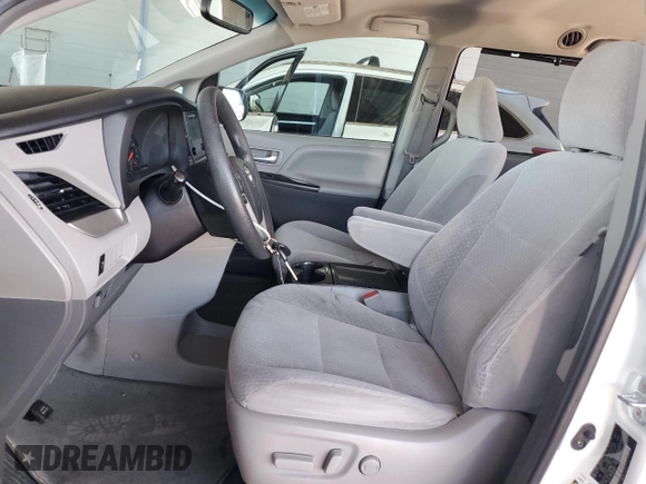 2017 Toyota Sienna LE with VIN 5TDJZ3DC2HS184057, listed as a Copart auction lot 60904795 with 62,055 mi miles and Salvage title. Bid and sale history available at DreamBid. Image 7.