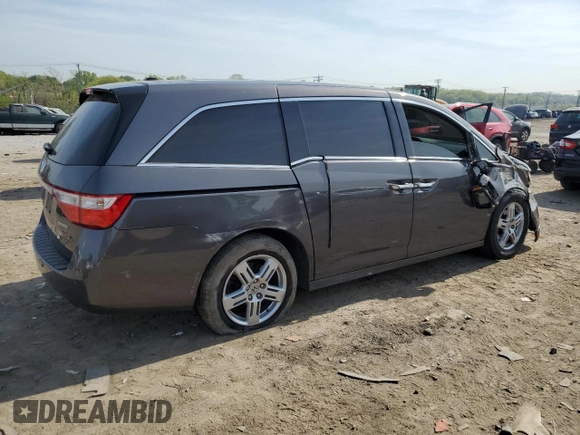 2012 Honda Odyssey Touring with VIN 5FNRL5H92CB134917, listed as a Copart auction lot 54437875 with 139,318 mi miles and Salvage Title. Bid and sale history available at DreamBid. Image 3.