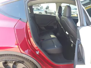 2024 Tesla Model Y Performance with VIN 7SAYGDEF3RF032980, listed as a IAAI auction lot 41619450 with 12,105 mi miles and . Bid and sale history available at DreamBid. Image 8.