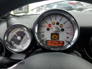 2010 MINI Convertible with VIN WMWMR3C50ATU97287, listed as a Copart auction lot 89116615 with 120,323 mi miles and Salvage Title. Bid and sale history available at DreamBid. Image 9.