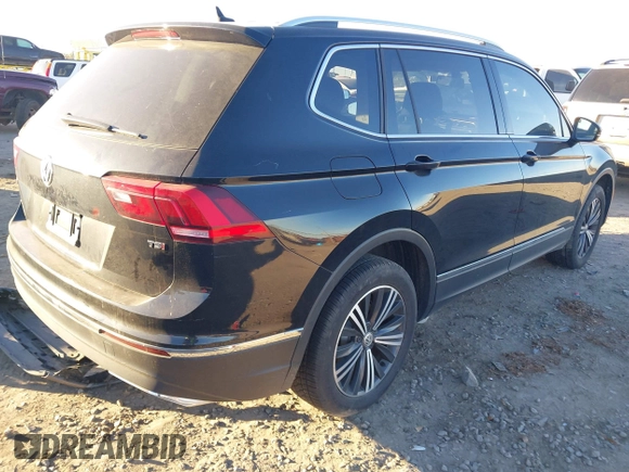 2018 Volkswagen Tiguan SEL with VIN 3VV3B7AX7JM117053, listed as a IAAI auction lot 40827695 with 71,489 mi miles and . Bid and sale history available at DreamBid. Image 4.