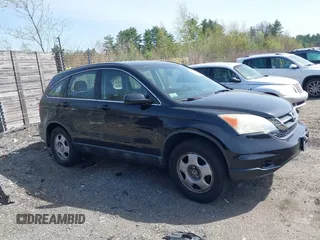 2011 Honda CR-V LX with VIN 5J6RE4H37BL060903, listed as a IAAI auction lot 42138576 with 124,559 mi miles. Bid and sale history available at carsss.com. Image 12.