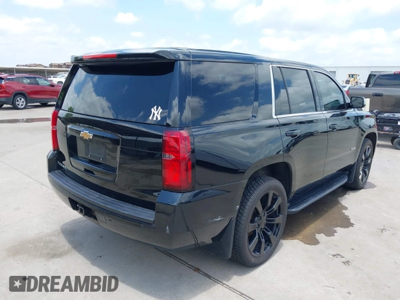 2015 Chevrolet Tahoe with VIN 1GNSK2KC4FR610534, listed as a IAAI auction lot 42357319 with 140,479 mi miles and . Bid and sale history available at DreamBid. Image 4.
