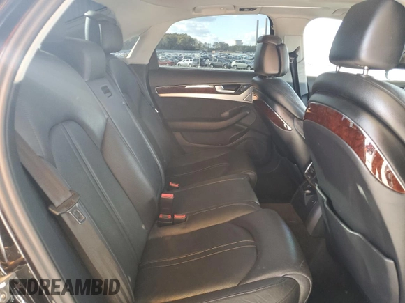 2013 Audi A8 3.0L z VIN WAUAGAFD9DN005655, wystawiony jako Copart lot #82819524 z przebiegiem 159 545 mil mil oraz Szkoda całkowita • Salvage title. Historia ofert i sprzedaży dostępna na DreamBid. Obrazek 11.