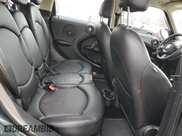 2014 MINI Countryman S z VIN WMWZC5C52EWP41173, wystawiony jako Copart lot #52725275 z przebiegiem 95 835 mil mil oraz Szkoda całkowita • Salvage title. Historia ofert i sprzedaży dostępna na DreamBid. Obrazek 10.