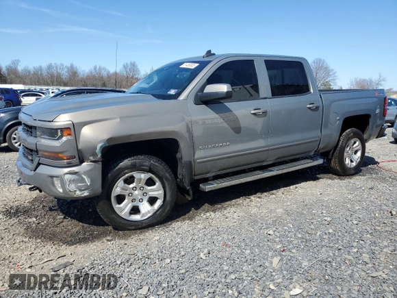 2017 Chevrolet Silverado 1500 LT with VIN 3GCUKREC0HG335785, listed as a Copart auction lot 51456305 with 104,614 mi miles and Salvage Title. Bid and sale history available at DreamBid. Image 1.